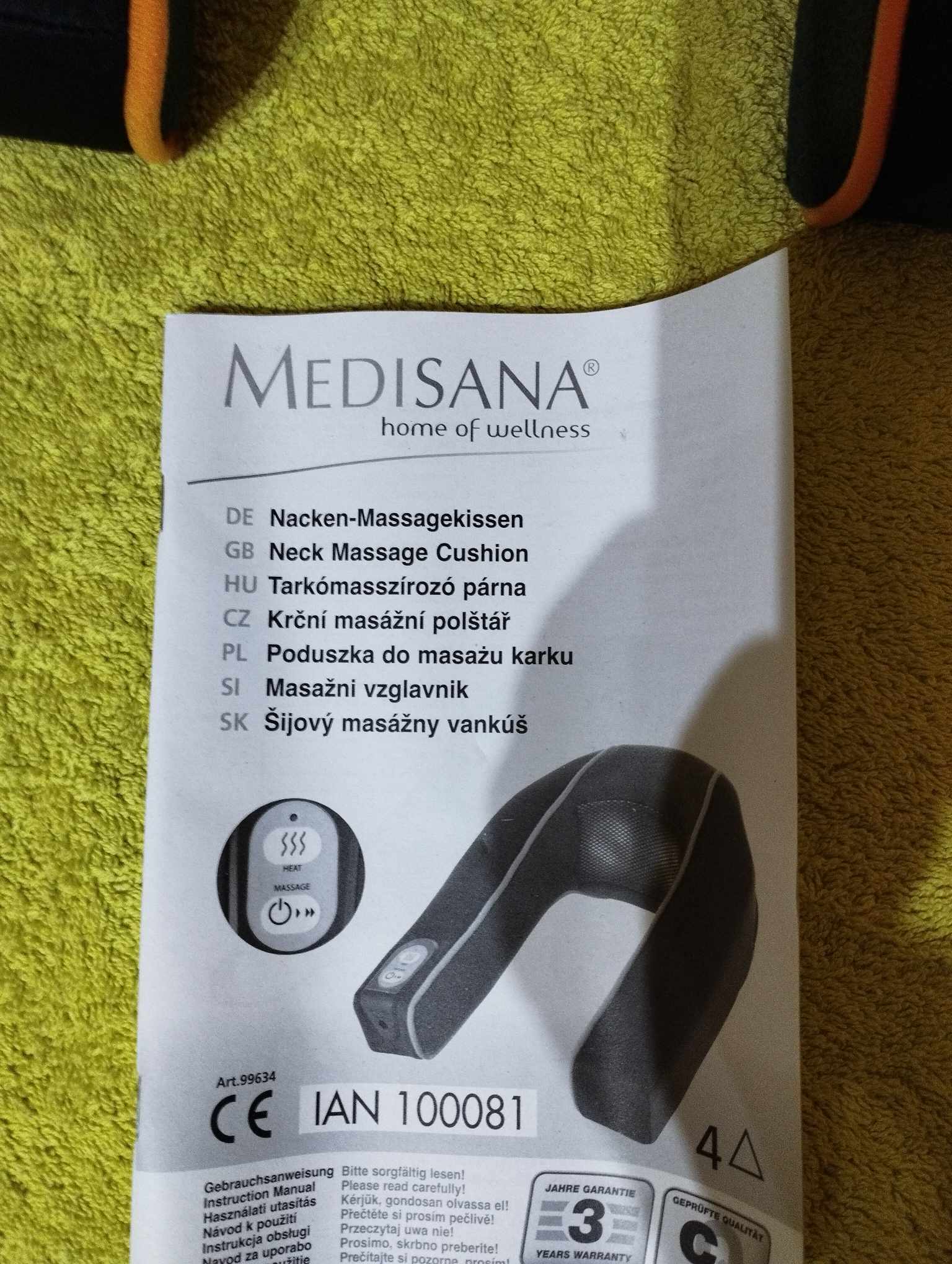 MEDISANA tarkómasszírozó vörös fénnyel és melegítő funkcióval